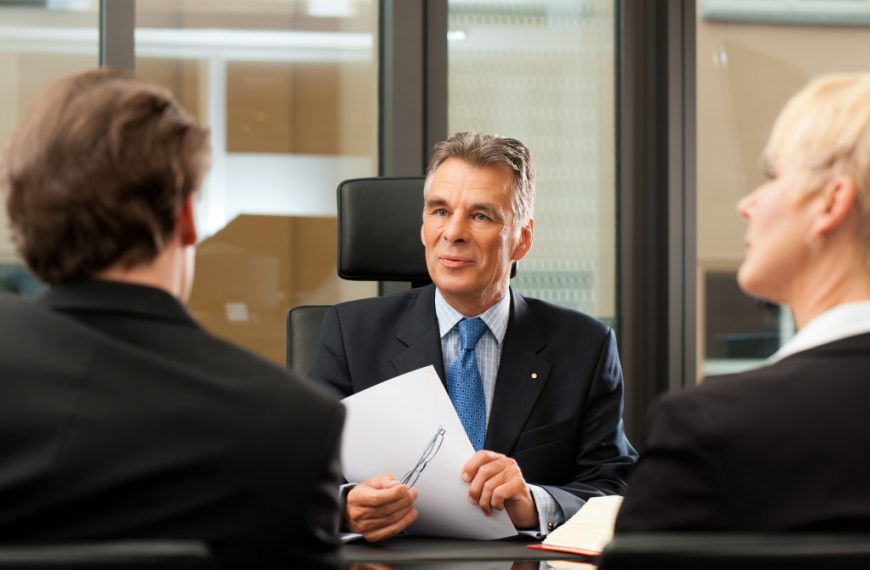 lawyer talking to his client