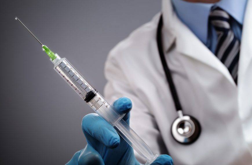 a doctor with syringe