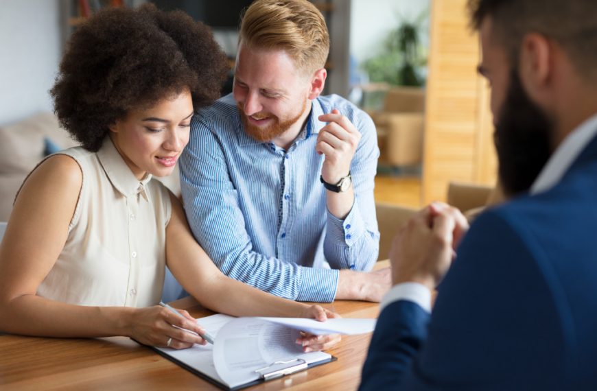 A couple buying a home with real estate agent